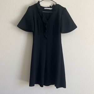 & other stories black knee length dress 
Ruffle V neck in size US 4